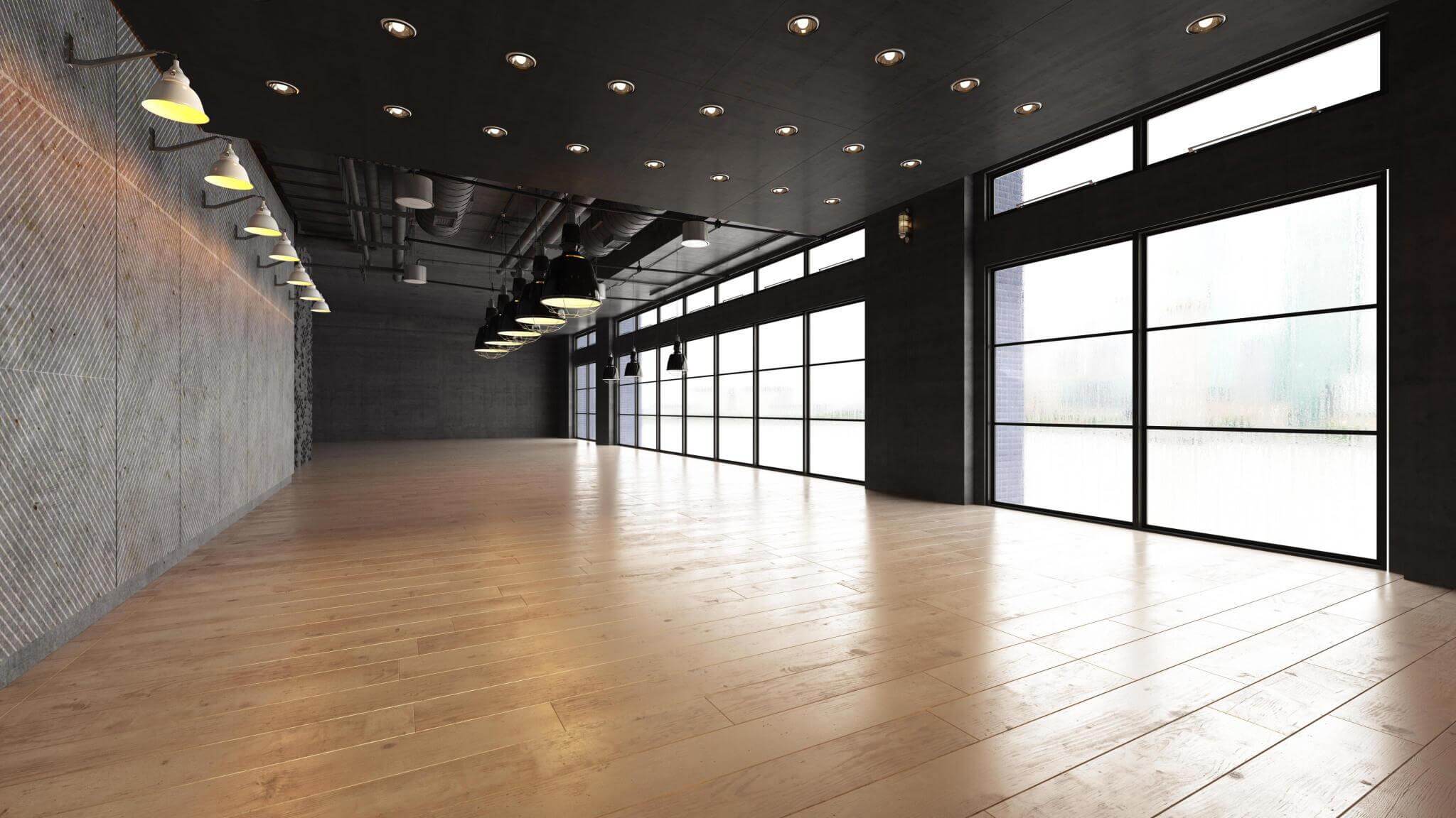 Restaurant Floor Sanding in Honoroak – spacious modern dining hall with wide windows and freshly sanded light oak plank flooring, reflecting natural daylight.